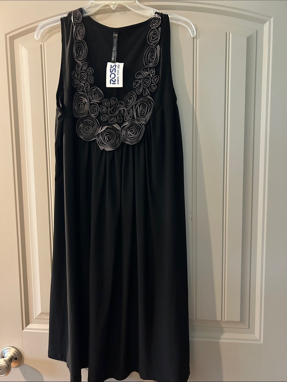 NWT Black Sleeveless Dress with Rosette Neckline
